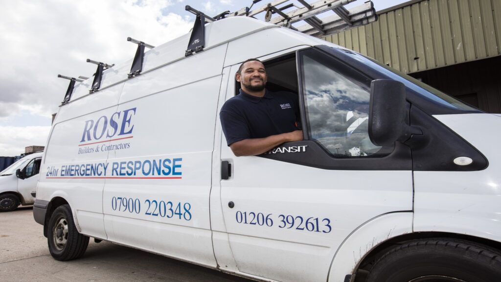 Rose Builders worker in a van