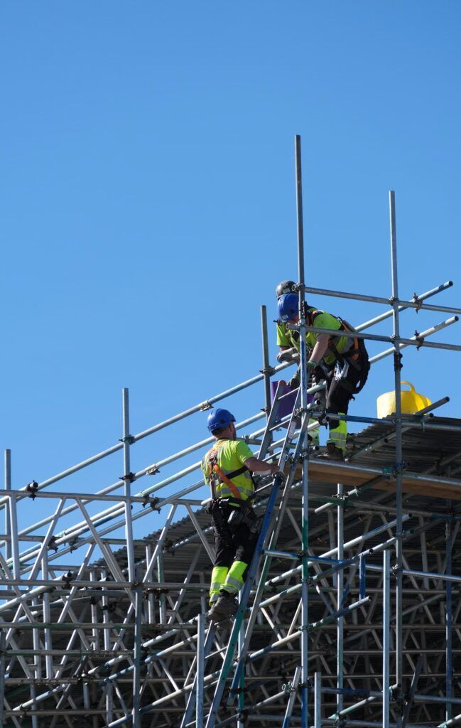 Nationwide Hire Solutions builders on scaffolding